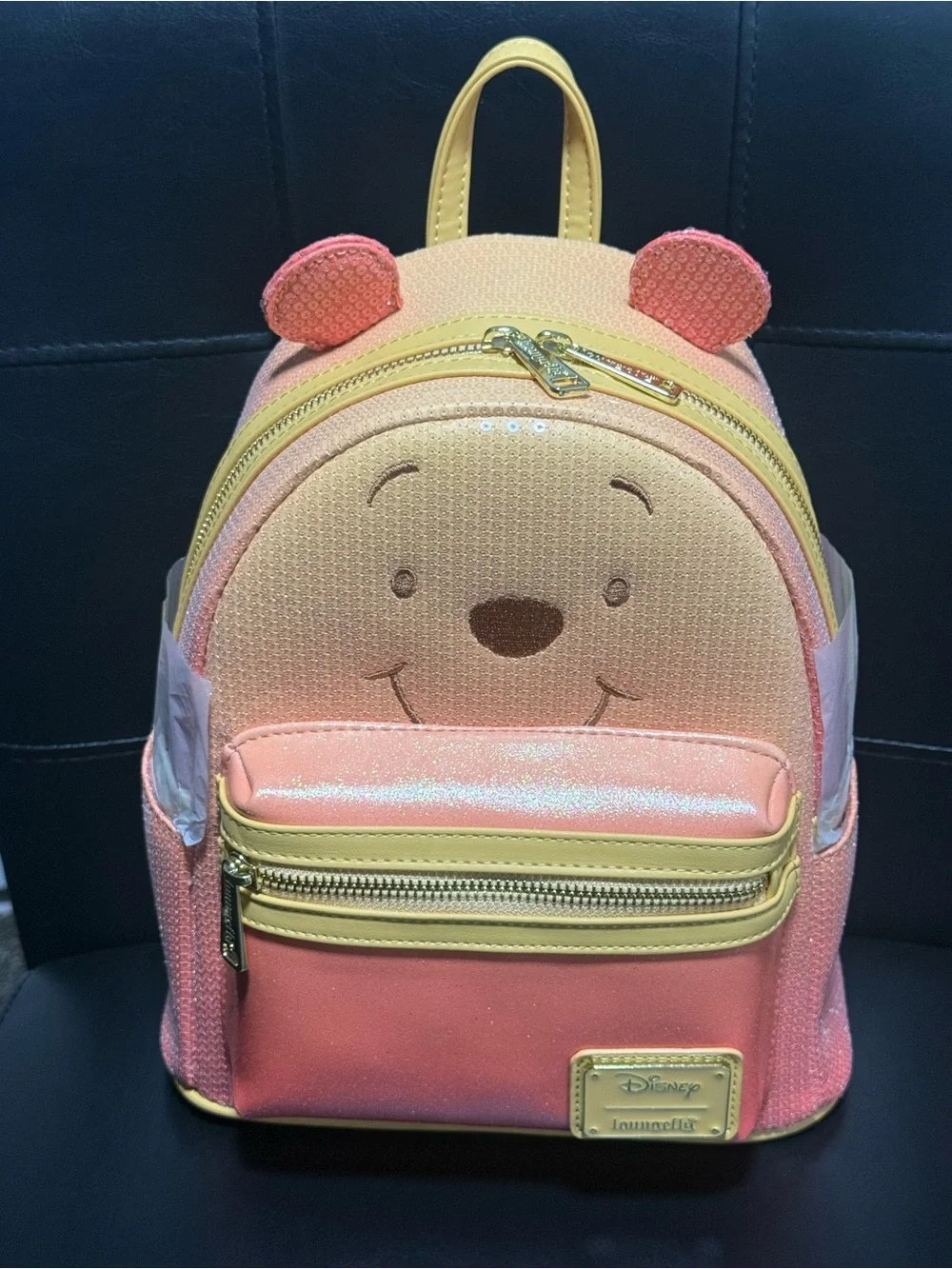 Loungefly Orange and Yellow Winnie the Pooh Mini Backpack
